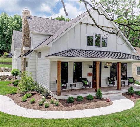 metal siding house with wrap around porch farmhouse|Revamp Your Residence with a Contemporary Farmhouse Exterior.